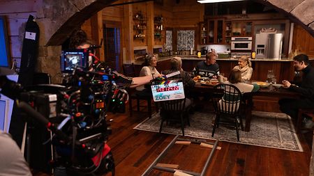 Camera on tracking dolly behind the scenes for dinner scene for “The Other Zoey"