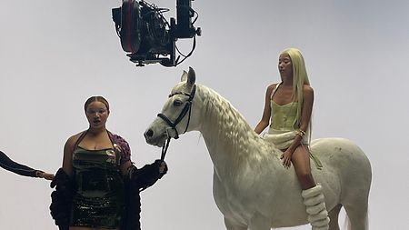 model Ayumi Patterson on Kim Shui’s 2024 Fall Winter Collection with horse and camera on jib