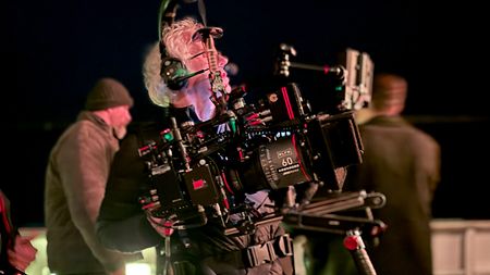 Behind the scenes of “The Amateur”: Martin Ruhe ASC on board a trawler shooting the final sequence of the film, which was shot on open water and involved several cameras on different boats and dinghies.