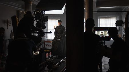 Behind the scenes of “House of Guinness”: The crew carry out a track shot with Emily Fairn, who plays Anne Guinness.